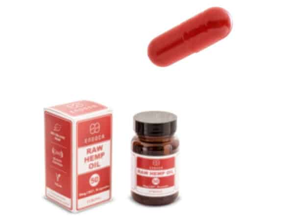 A bottle of Endoca CBD Capsules 15% (30 pcs) with a red pill next to it.